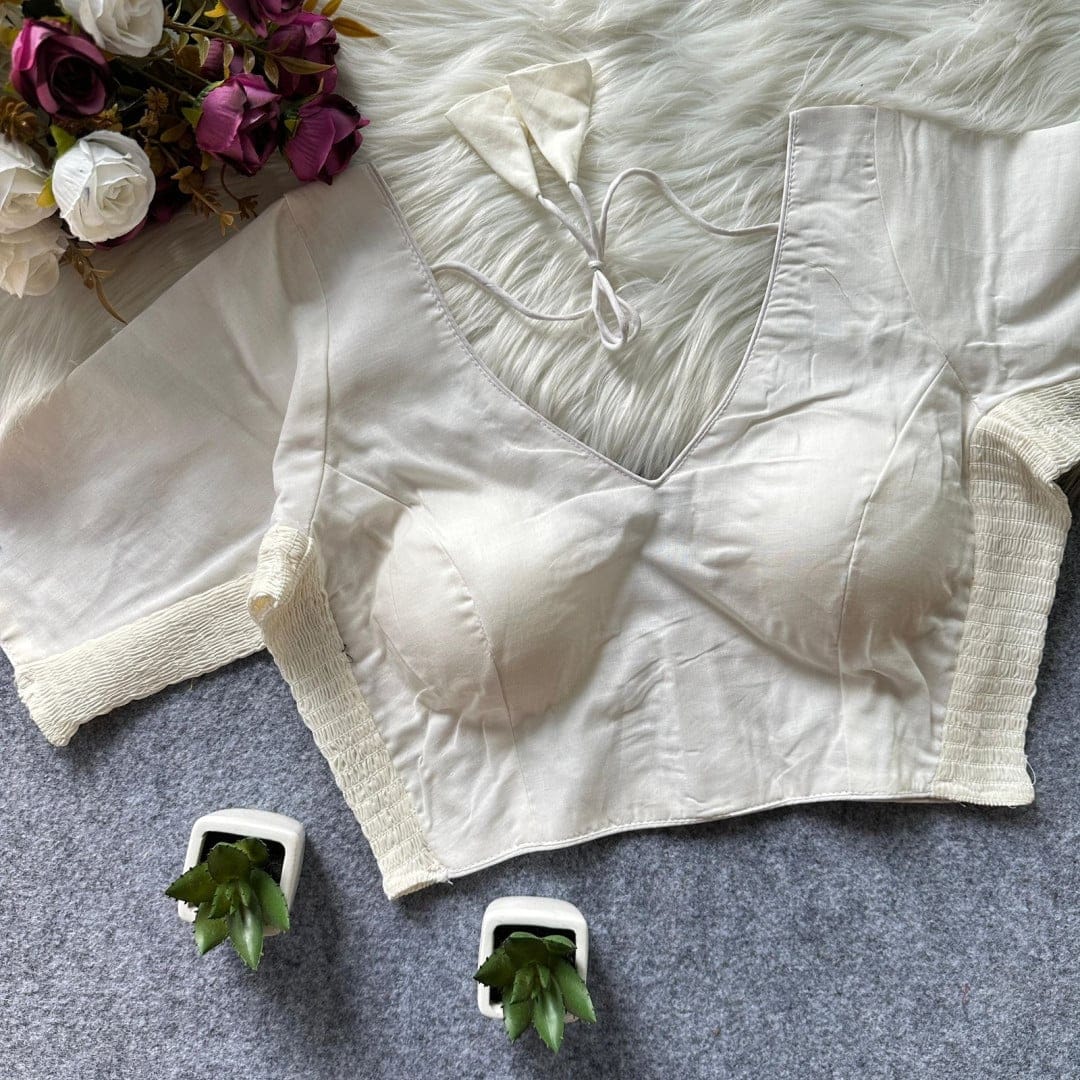 Off white color pure cotton blouse with elastic attach for fitting
