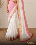 White and pink color half and half mul cotton saree with fancy tassel work - Indiva By Silva